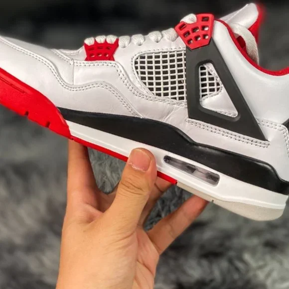 Size 11 Jordan 4 Retro white cement basketball shoes